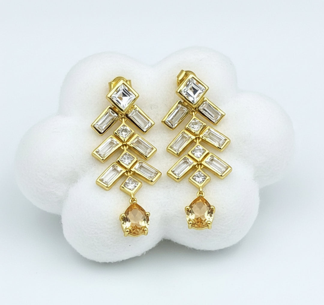 A pair of 925 sterling silver gold-tone earrings featuring cascading rows of square-shaped Citrine and White Topaz stones.