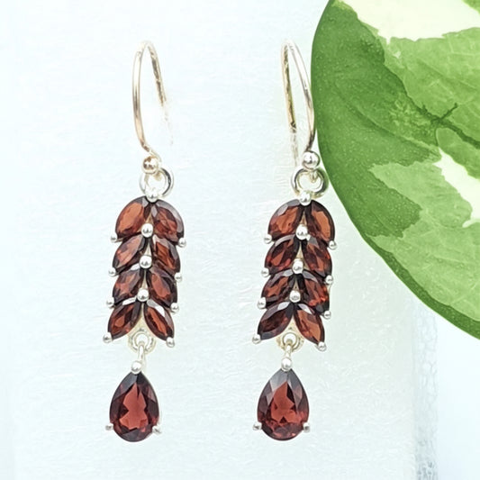 925 sterling silver earrings studded with garet gemstones