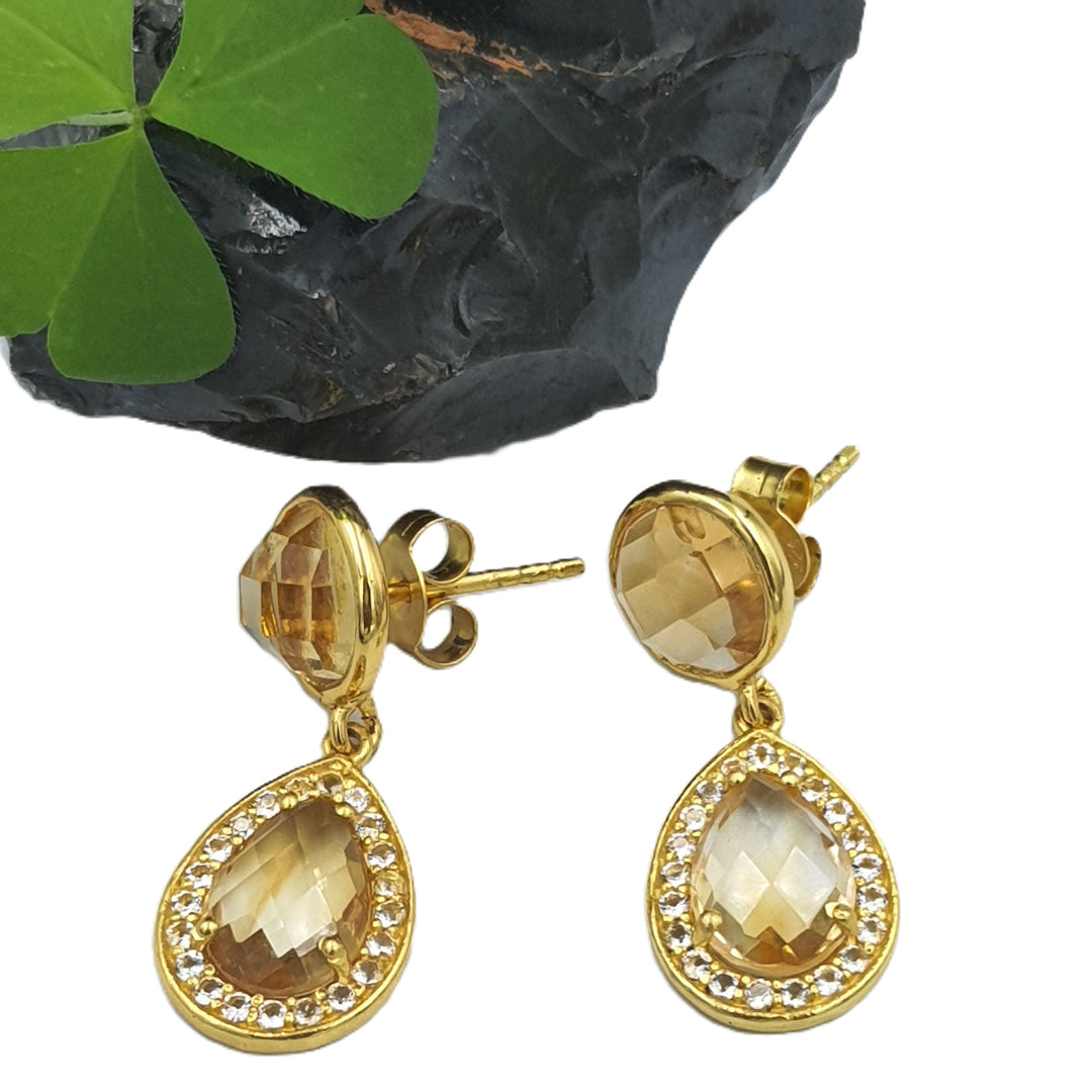 Side view of citrine and white topaz earrings in yellow-gold plated 92.5 sterling silver, highlighting their slim, sparkling silhouette.