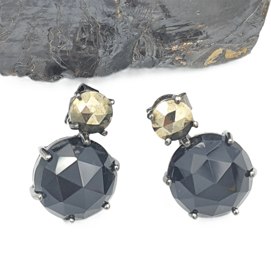 Pyrite and black onyx gemstone earrings crafted in black oxidized silver, featuring an elegant statement design.