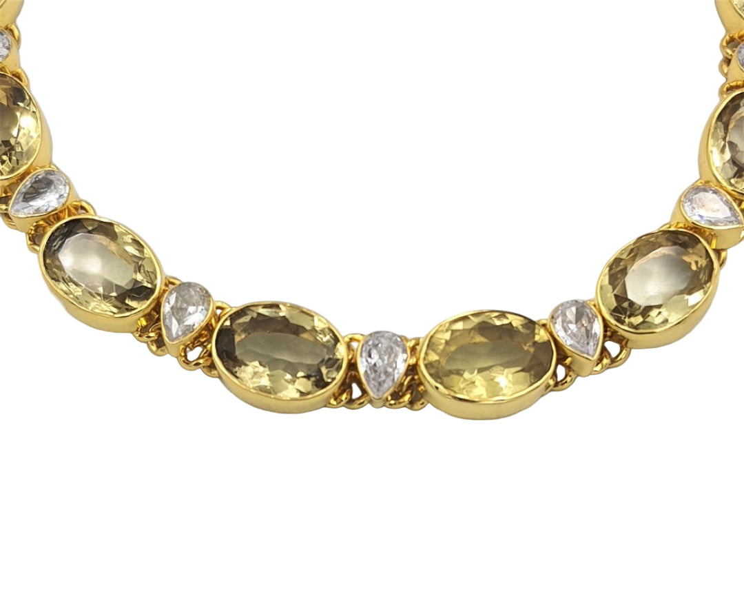Lemon topaz and cubic zirconia necklace with a 14-inch gold-plated chain, highlighting its sophisticated sparkle.