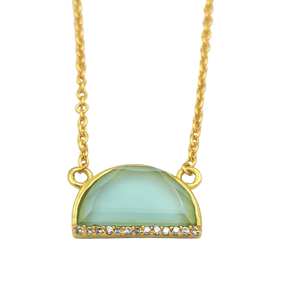 Close-up of aqua chalcedony and cubic zirconia necklace in gold-plated 92.5 sterling silver, highlighting the soft blue stone and delicate drop detail.