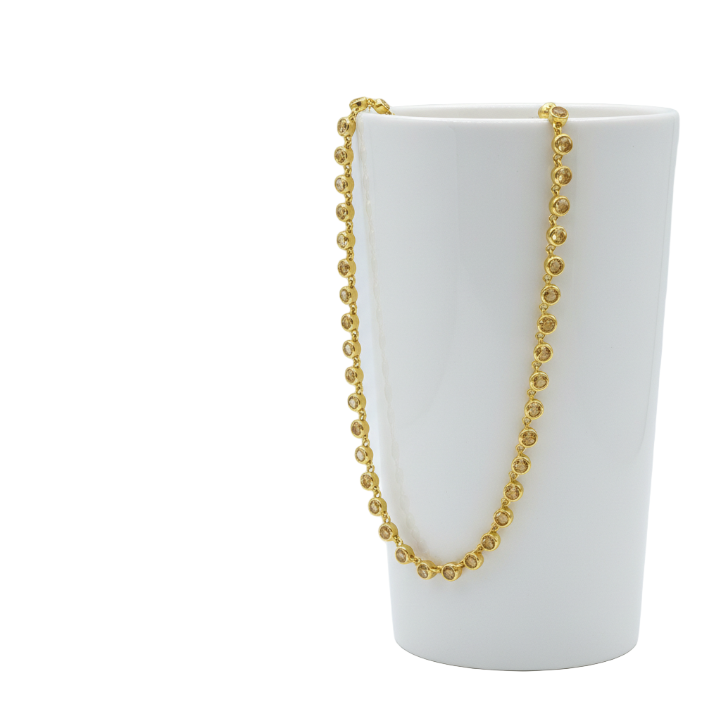 Close-up of citrine stone necklace in gold-plated 92.5 sterling silver, showcasing the vibrant sun-like yellow gemstones.