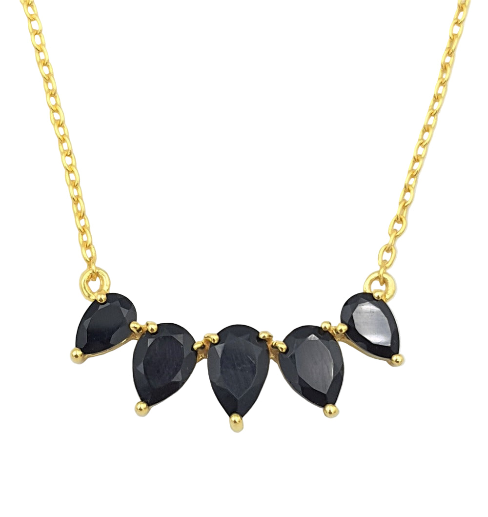 Close-up of black onyx necklace in gold-plated 92.5 sterling silver, highlighting the varying stone sizes and deep night-sky shine.