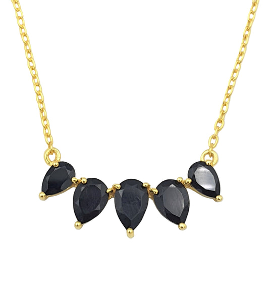 Close-up of black onyx necklace in gold-plated 92.5 sterling silver, highlighting the varying stone sizes and deep night-sky shine.