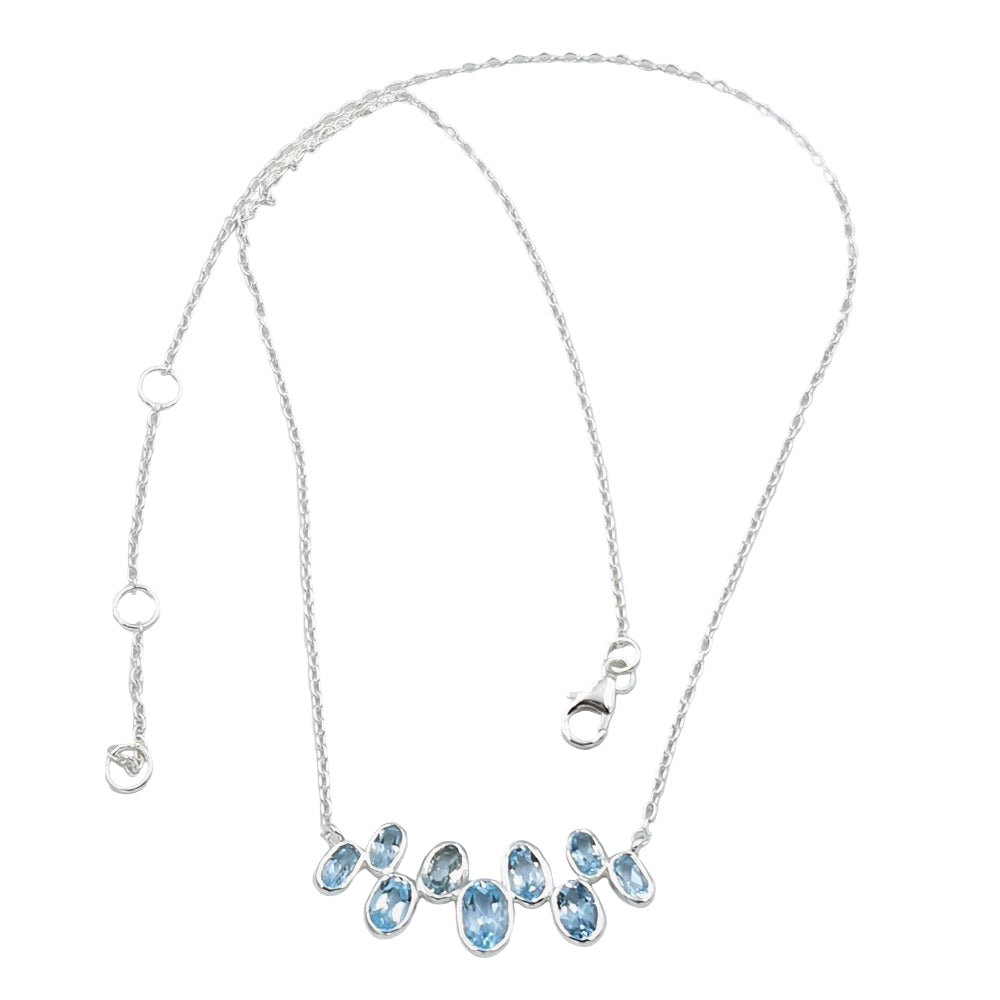 Blue topaz gemstone necklace in 92.5 sterling silver, featuring a lagoon-inspired elegant design.