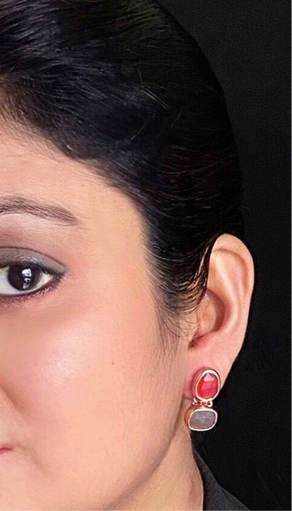 Carnelian and gray chalcedony earrings in yellow-gold plated 92.5 sterling silver worn by a woman, showing their earthy, elegant look when styled.