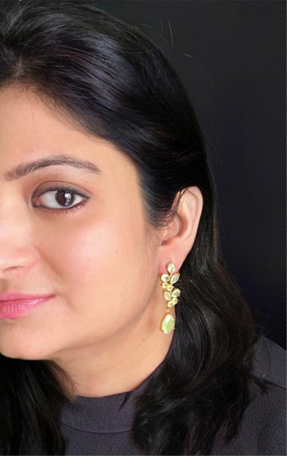 Prehnite chalcedony earrings in gold-plated 92.5 sterling silver worn by a woman, showing their elegant nature-inspired look when styled.